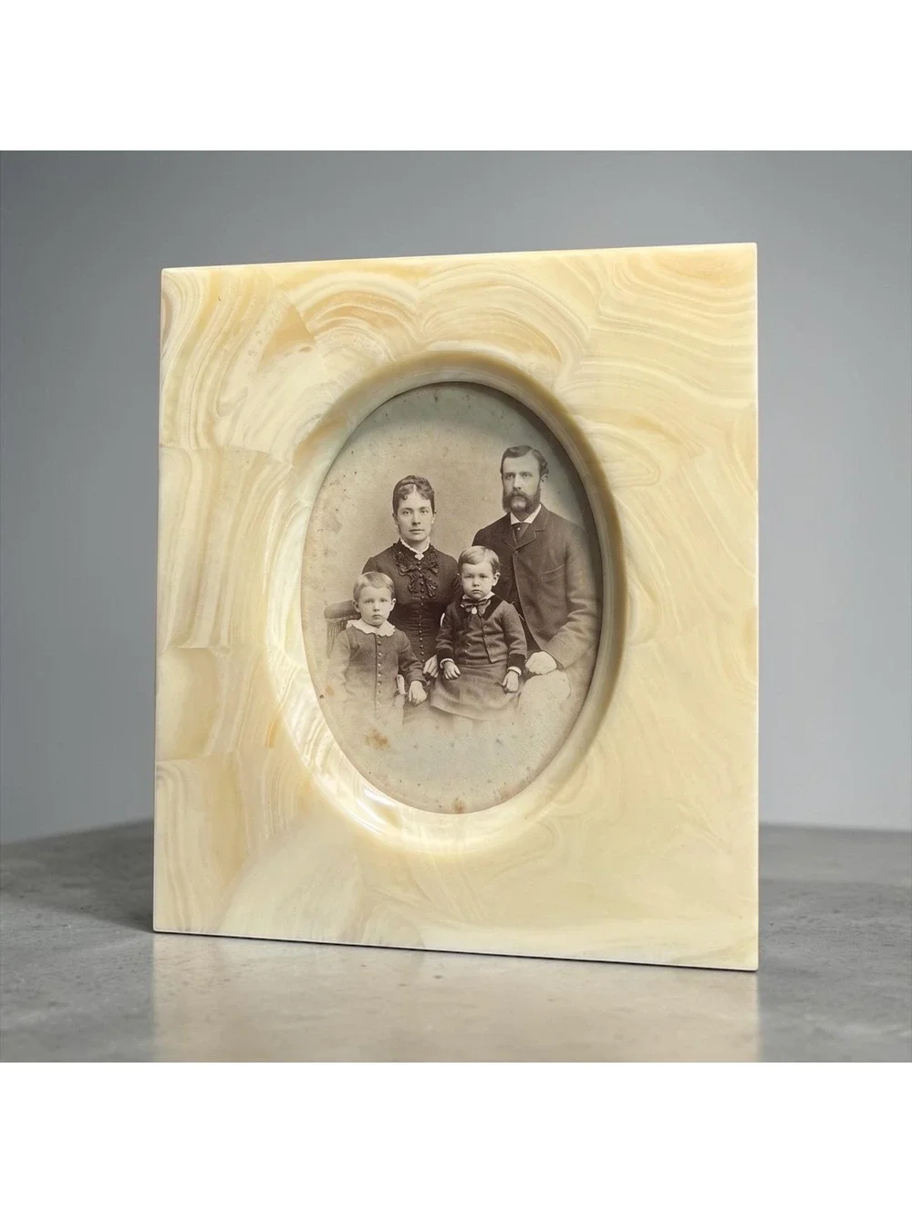 Creamy Pale Yellow Faux Alabaster Swirl Resin Frame with Oval Opening